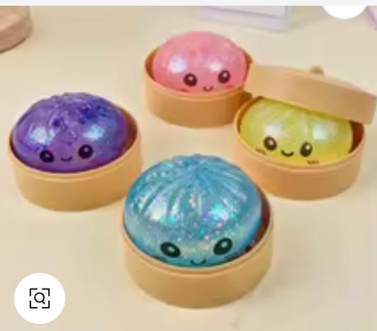 Cute glitter squishy dumplings in steamer boxes